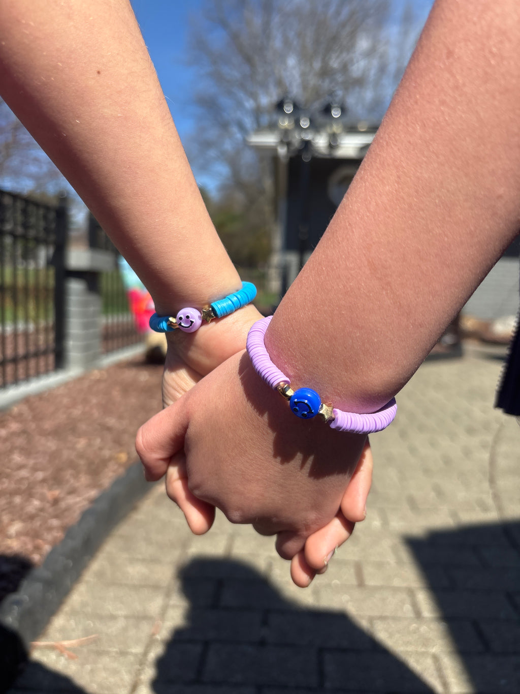 2 bracelets purple and blue